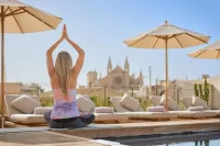 Yoga auf der Dachterrasse mit herrlichen Ausblick